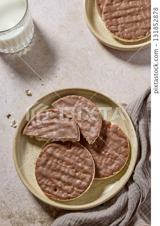 plate of rice galettes cakes cookies covered with milk chocolate plate of rice galettes cakes cookies covered with milk chocolate 131852878