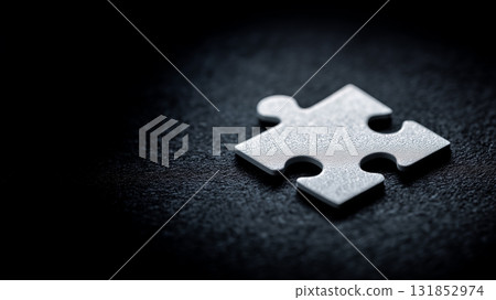 A puzzle piece presented as the key to solving a problem or understanding 131852974