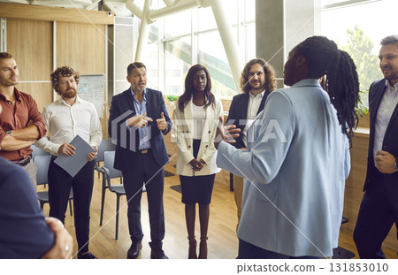 Team of business people discussing mistakes and problems during work meeting in office 131853010