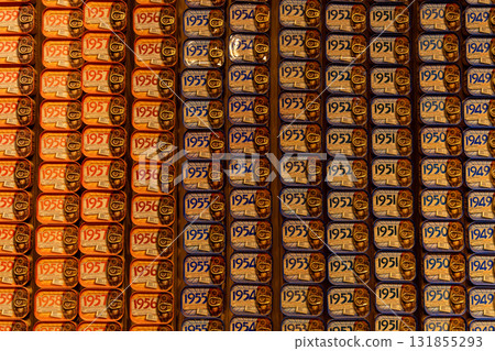 Colorful Vintage Sardine Tin Display with Bold Year Labels and Patterns Colorful Vintage Sardine Tin Display with Bold Year Labels and Patterns 131855293