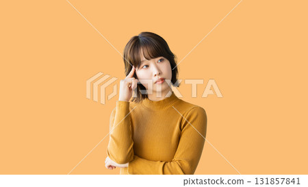 A woman thinking A woman thinking 131857841