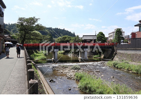 The red Nakabashi Bridge over the Miyagawa River in Hida Takayama 131859636