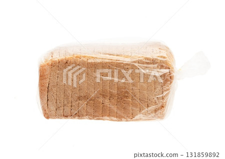 Sliced bread sits inside clear plastic packaging, showcasing its uniform slices and fresh appearance, ideal for culinary presentations, recipes, or bakery advertisements. 131859892