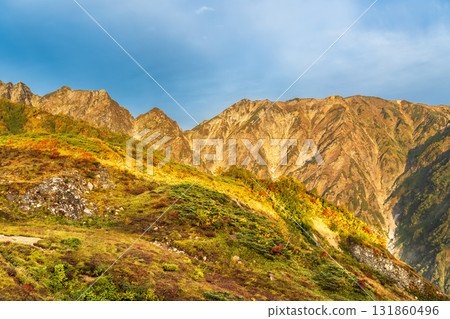 Early morning hike through autumn leaves at Happoyama and the sunrise in the Northern Alps 131860496