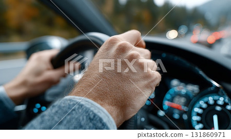 Driver's Hands Firmly Holding Steering Wheel Inside Modern Vehicle Interior with Blurred Background 131860971
