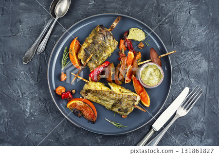 Grilled fish on skewers, pollock. Grilled fish on skewers, pollock. 131861827