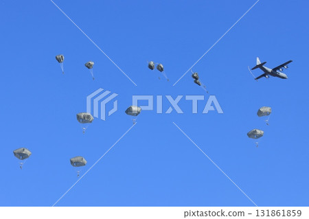 Paratroopers jumping out of a transport plane, parachute drop, special forces, airborne drop Paratroopers jumping out of a transport plane, parachute drop, special forces, airborne drop 131861859