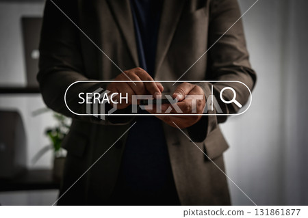 Close-up of businessman using smartphone with virtual search bar, symbolizing job search, recruitment, hiring, resume upload, and online career growth. 131861877