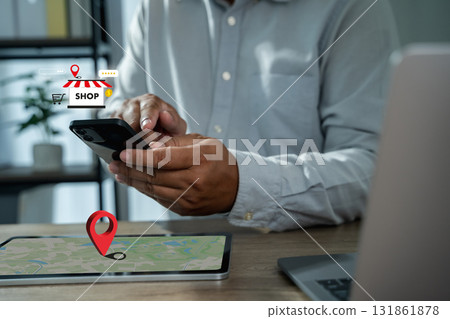 Local SEO store locator on smartphone and tablet map with red pin and shop icon shows nearby search GPS navigation mobile shopper journey business search GPS 131861878