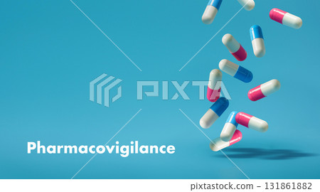 Pharmacovigilance concept with colorful capsules on blue background. Drug safety, pharmaceutical monitoring, healthcare research, and medical treatment theme. 131861882