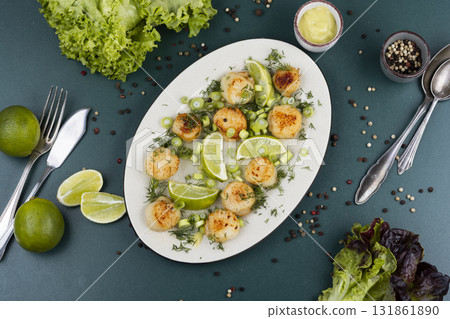 Scallops with a basil sauce. Scallops with a basil sauce. 131861890