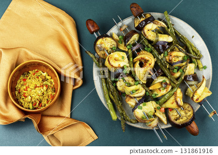 White fish fillet with asparagus, yummy grilled tilapias. 131861916