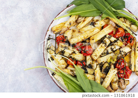 Roasted Asparagus with tomatoes and wild garlic. Roasted Asparagus with tomatoes and wild garlic. 131861918