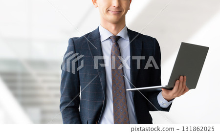 Male businessman with laptop 131862025