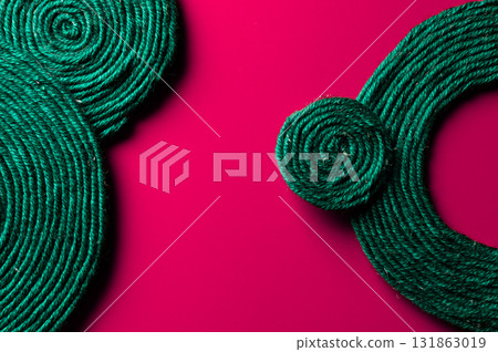 A solid background of colorful threads for cross stitch and needlework. Textured background for needlework and design. Rainbow of threads. Rows of colorful embroidery threads. 131863019