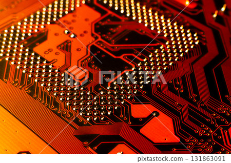 Macro photo of application specific integradet circuit package mounted on printed circuit board. Hardware technology concept. Motherboard. Computer component Macro photo of application specific integradet circuit package mounted on printed circuit board. Hardware technology concept. Motherboard. Computer component 131863091