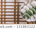 jeolpyeon, korean style Patterned Rice Cake, Short grain rice powder sieved and pressed into a rice cake mold. Unlike other rice cakes made with non-glutinous rice, jeolpyeon is quite chewy and often  131863122