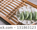 jeolpyeon, korean style Patterned Rice Cake, Short grain rice powder sieved and pressed into a rice cake mold. Unlike other rice cakes made with non-glutinous rice, jeolpyeon is quite chewy and often  131863123