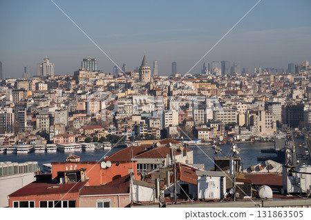 Istanbul Skyline Panoramic View Cityscape Turkey: Elevated perspective showcasing historical and modern architecture, illustrating urban density. Istanbul Skyline Panoramic View Cityscape Turkey: Elevated perspective showcasing historical and modern architecture, illustrating urban density. 131863505