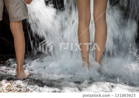 Children playing in the stream 131863625