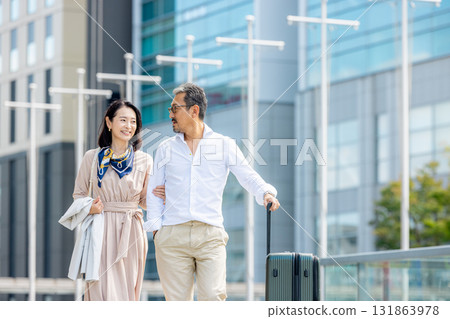 Men and women traveling Men and women traveling 131863978