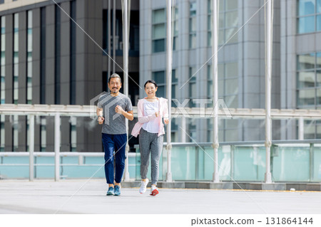 Senior couple jogging Senior couple jogging 131864144