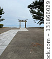 A torii gate with a view of the sea 131866029
