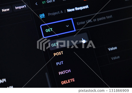 Developer clicks GET method in API request tool, showing HTTP options for web development, software engineering, and data fetching operations Developer clicks GET method in API request tool, showing HTTP options for web development, software engineering, and data fetching operations 131866909