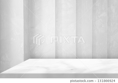 Empty White Marble Table Top on a Textured Gray Wall Background, for product display. 131866924