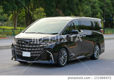 Image of a luxury black minivan Image of a luxury black minivan 131866972
