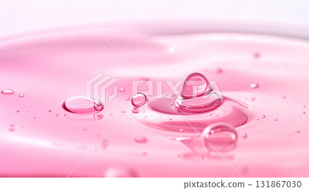 drop of water on pink background 131867030