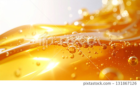 oil drops on a glass of water 131867126