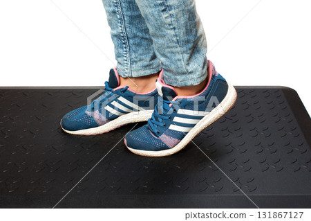 Close up of woman wearing snickers. 131867127