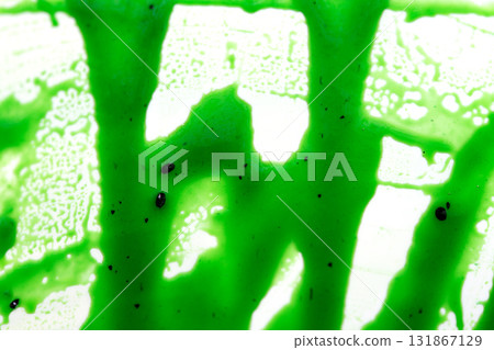 Kiwi jam blured macro photo for creative design. Kiwi jam blured macro photo for creative design. 131867129