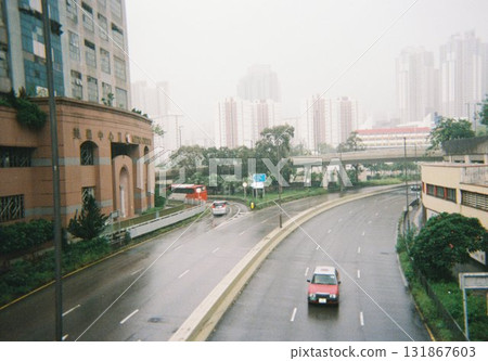 Hong Kong city and quiet roads after the rain (red taxis and skyscrapers) Hong Kong city and quiet roads after the rain (red taxis and skyscrapers) 131867603