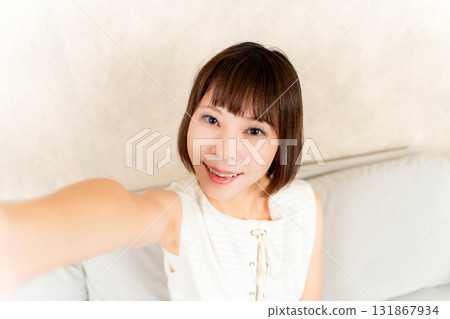 Woman taking a selfie Woman taking a selfie 131867934
