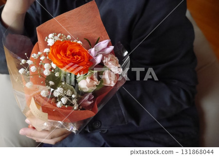 A man with a bouquet of flowers (no face) A man with a bouquet of flowers (no face) 131868044