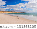 Scenic coastline at Port Willunga with turquoise water and white clouds 131868105