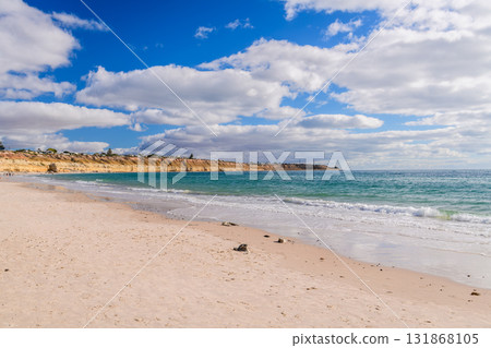 Scenic coastline at Port Willunga with turquoise water and white clouds Scenic coastline at Port Willunga with turquoise water and white clouds 131868105