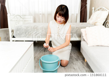 A woman clenched with cloth A woman clenched with cloth 131868111