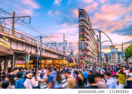 Tokyo cityscape in October. Inbound tourism continues...a threatening number of people...view of Ueno Station and Ameyoko, bustling with foreign tourists. Tokyo cityscape in October. Inbound tourism continues...a threatening number of people...view of Ueno Station and Ameyoko, bustling with foreign tourists. 131868882