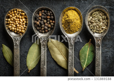 spices and herbs on a wooden background 131869188