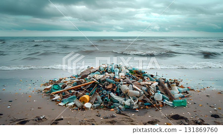 pile of plastic waste and bottles on beach shore 131869760