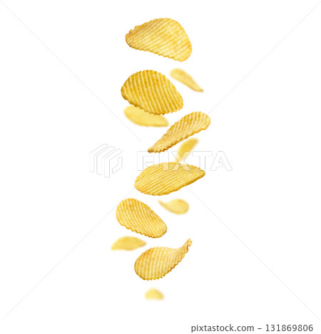 Fluted potato chips levitate on a white background Fluted potato chips levitate on a white background 131869806