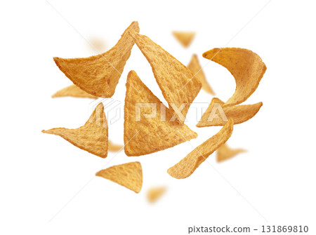 Corn chips of triangular shape levitate on a white background Corn chips of triangular shape levitate on a white background 131869810