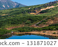 View of Kagamiike Pond and Mt. Daisetsuzan from the walking trail of Mt. Asahidake 131871027