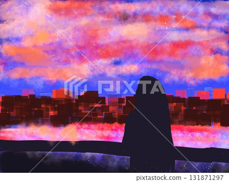 A silhouette gazing at the red sky 131871297