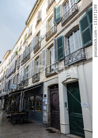A street lined with historic buildings in Bayonne, the heart of the French Basque Country A street lined with historic buildings in Bayonne, the heart of the French Basque Country 131871299