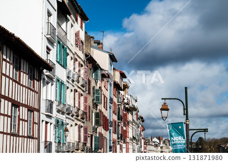 A street lined with historic buildings in Bayonne, the heart of the French Basque Country A street lined with historic buildings in Bayonne, the heart of the French Basque Country 131871980