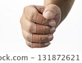 Fist with finger bandages is shown, conveying sense of resilience and healing. bandages are wrapped around fingers, indicating recovery or protection 131872621